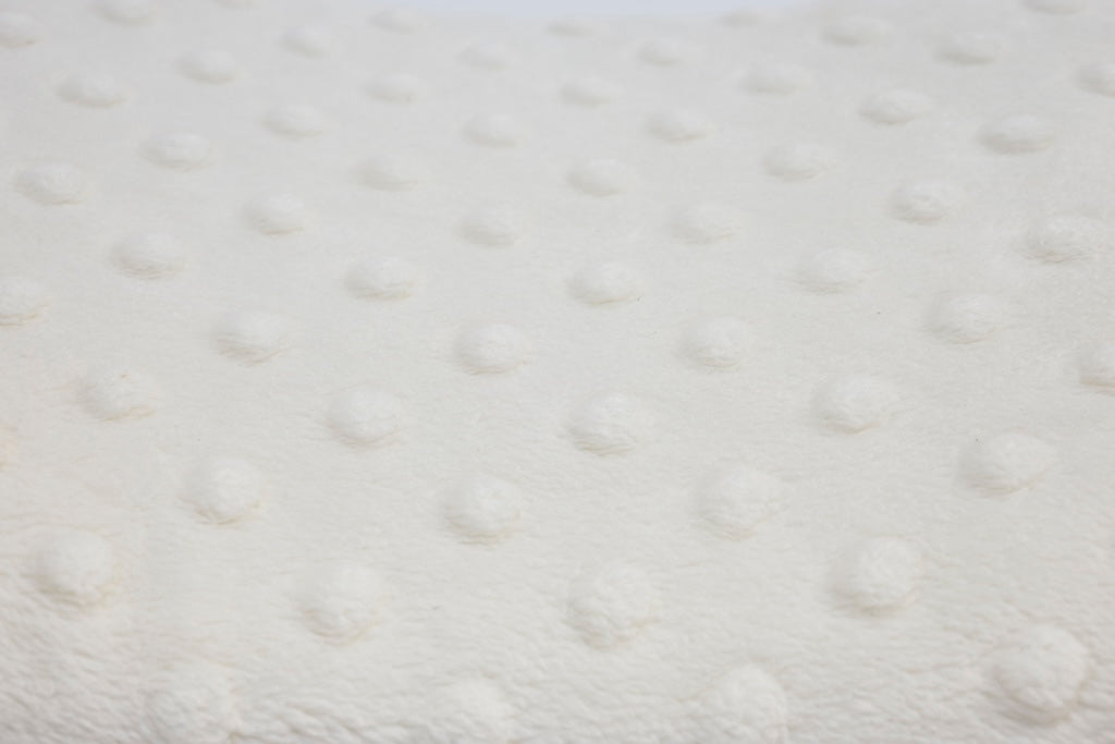 close up texture of cream pillowcase
